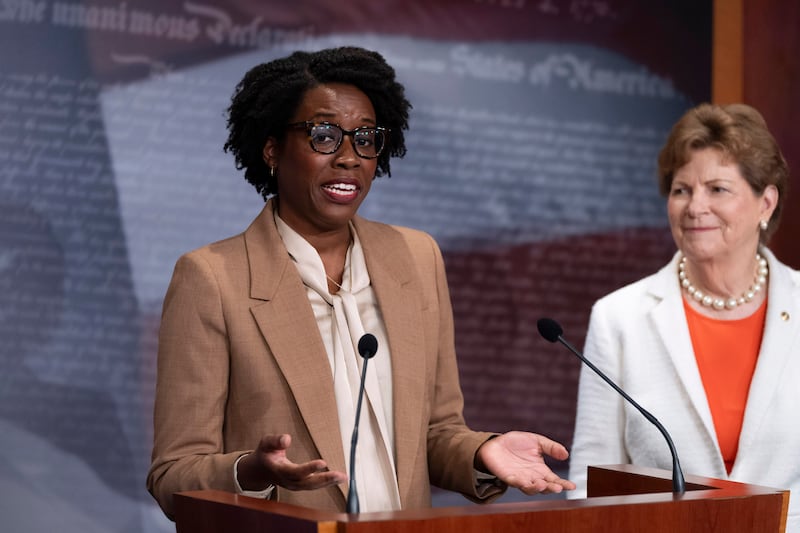 Rep. Lauren Underwood, D-Ill., accompanied by Sen. Jeanne Shaheen, D-N.H., right, speaks about the Affordable Care Act at a news conference at the Capitol in Washington, Wednesday, Sept. 25, 2024. (AP Photo/Ben Curtis)