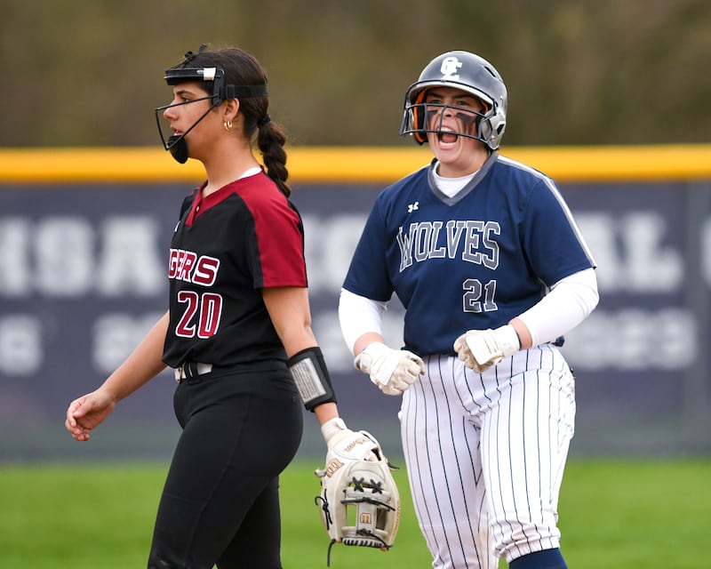 Oswego East’s Ryenne Sinta (21) celebrates after getting a double during the game on Thursday April 17, 2025, while taking on Plainfield North held at Oswego East High School.