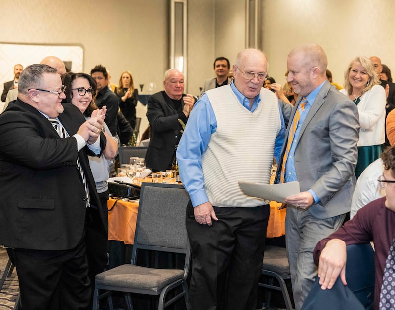 Jerry Eiserman, center, was honored at the McHenry Area Chamber of Commerce's annual gala on Saturday, January 24, 2026, at the Holiday Inn in Crystal Lake.