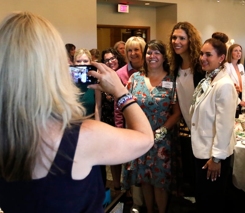 Award recipient Lynn Caccavallo is photographed with her supporters during the Northwest Herald's Women of Distinction award luncheon Wednesday June 4, 2025, at Boulder Ridge Country Club, in Lake in the Hills. The luncheon recognized ten women in the community as Women of Distinction.
