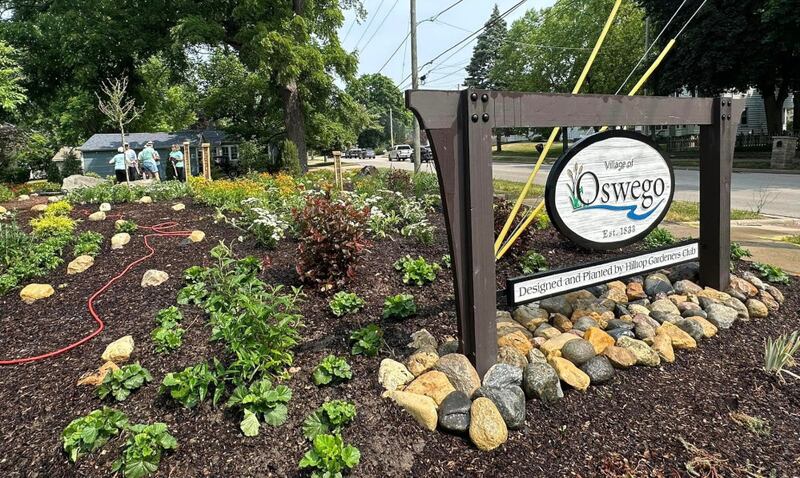 The new pollinator garden designed and planted by the Hilltop Gardeners Garden Club features a new entryway sign and a colorful landscape of native and pollinator-friendly flowers.