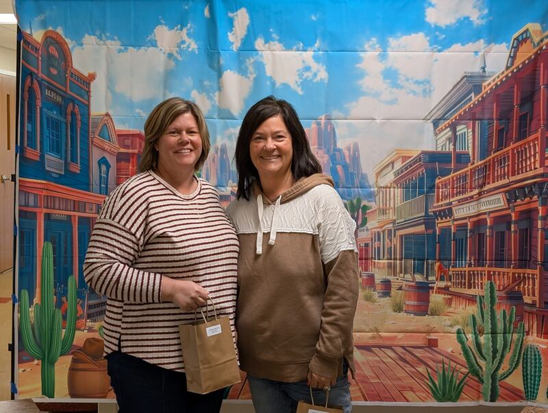 Outstanding 4-H Leader Team Award was presented to Stephanie King (L) and Julie Beckman (R) of the Mighty Clovers 4-H Club.