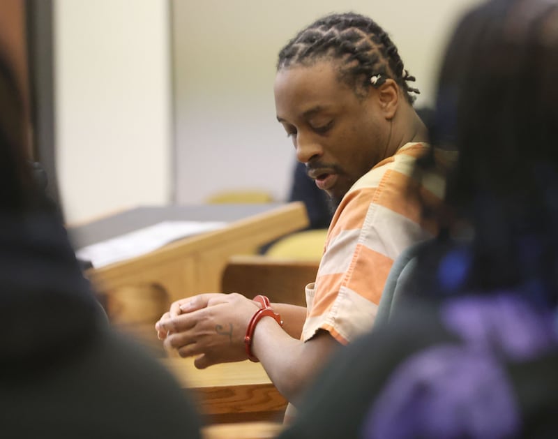 Malcom Whitfield enters the courtroom during his sentencing at the La Salle County Government Complex in Ottawa.