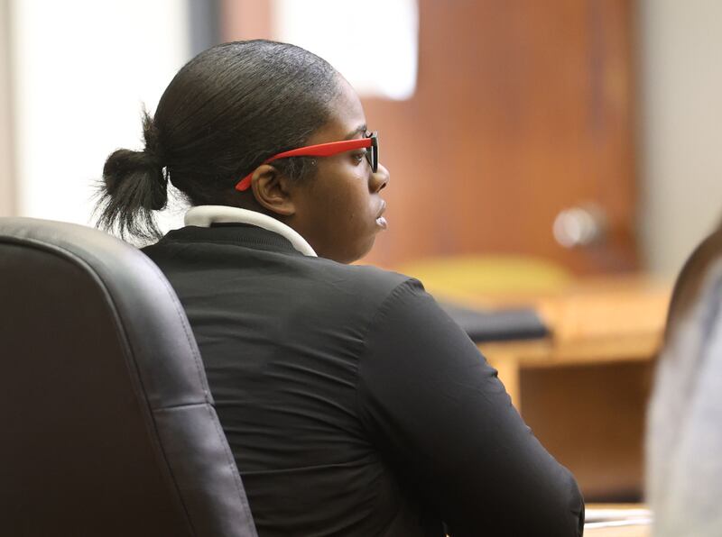Ebony Green of University Park, listens to her sentencing in the courtroom on Thursday, Jan. 29, 2026 at the La Salle County Governmental Complex in Ottawa. Green claimed to run a day care service in Ottawa with earnings of $100,000, but Ebony Green was actually a hairstylist earning a fraction of that. Yet she received a COVID-19 relief loan for almost $20,000.