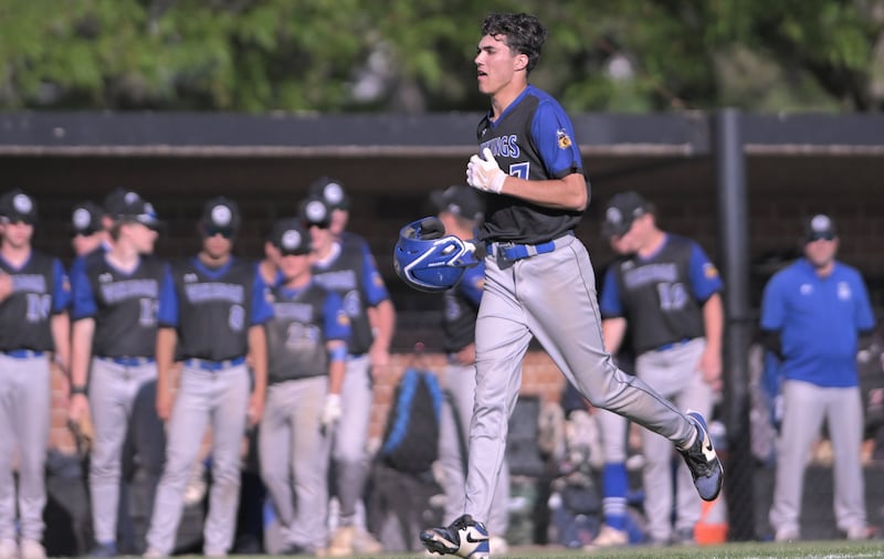 Geneva’s Mason Bruesch approaches home plate with a 2 RBI home run in a baseball game against St. Charles East in St. Charles on Wednesday, May 20, 2026.