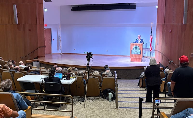 Audience members listen during a Bill Foster town hall in Crystal Lake April 8. 2026.
