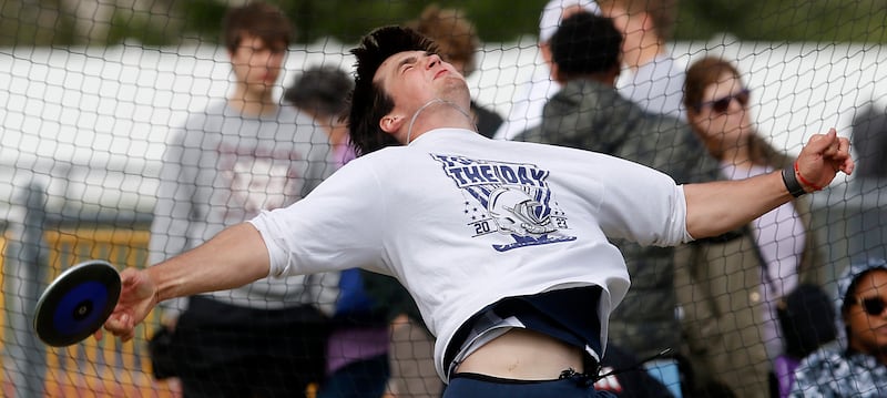 Cary-Grove’s Logan Abrams throws the discus during the Huntley IHSA Class 3A Boys Sectional Track and Field Meet on Thursday, May 22, 2025, at Huntley High School.