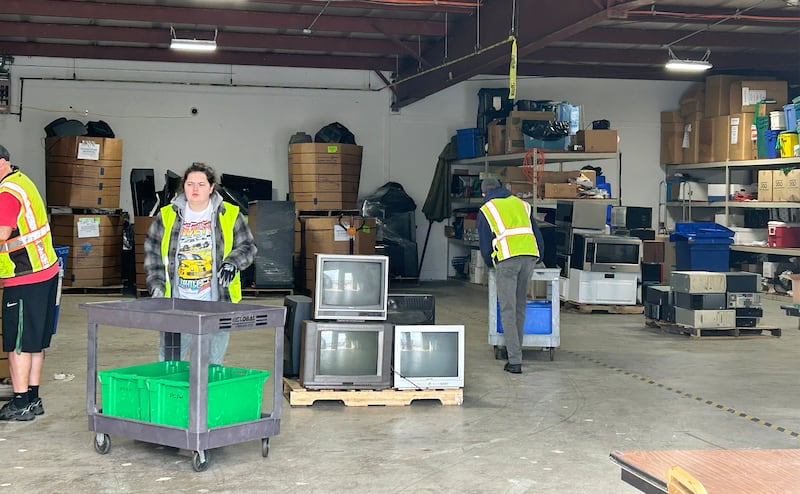 Volunteers unload electronics during one of the Ogle County Solid Waste Department's recycling events in Oregon. The next electronic recycling event is Friday, June 27, in Oregon.