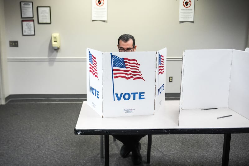 A person votes in the Virginia redistricting referendum at Fairfax Government Center, Tuesday, April 21, 2026, in Fairfax, Va. (AP Photo/Julia Demaree Nikhinson)
