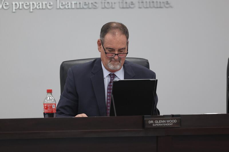 Superintendent Dr. Glenn Wood looks over notes at the Plainfield School District 202 board meeting on Wednesday, August 28, 2024 in Plainfield.