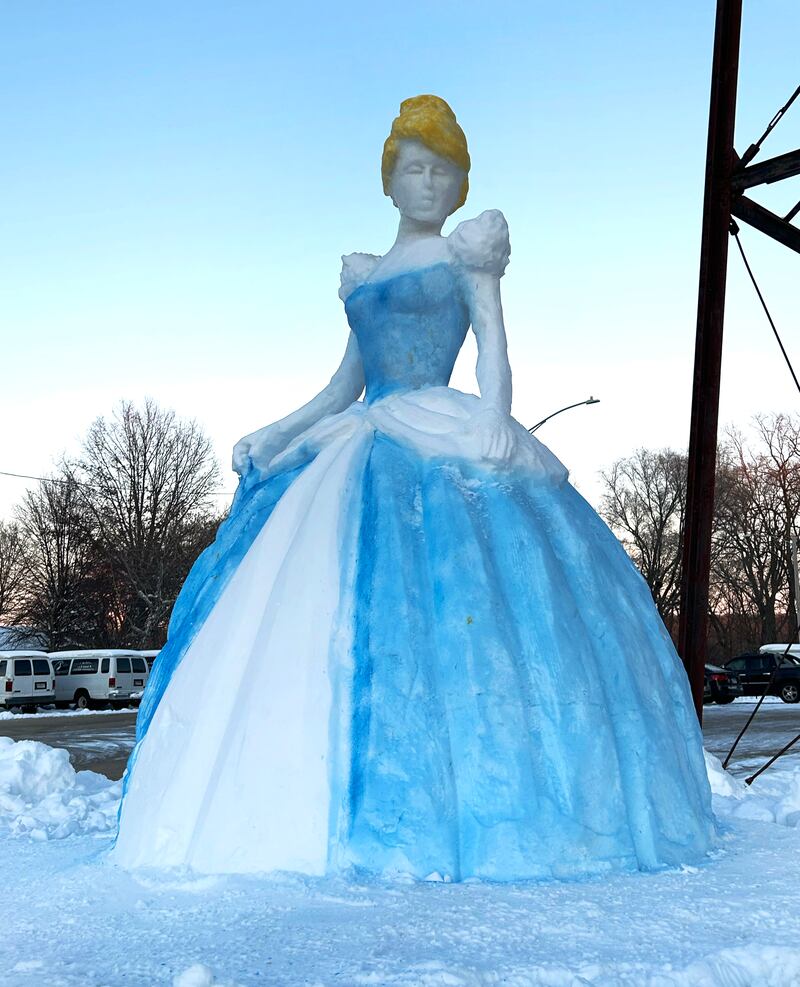 Fran Volz created this Cinderella snow sculpture on the northwest corner of Conover Square at 203 N. 3rd Street in Oregon. He painted the sculpture on Thursday, Dec. 4, 2025.