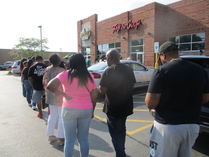 People line up outside Fry the Coop at its new Joliet location on Thursday for free chicken sandwiches on Thursday, Aug. 14, 2025.