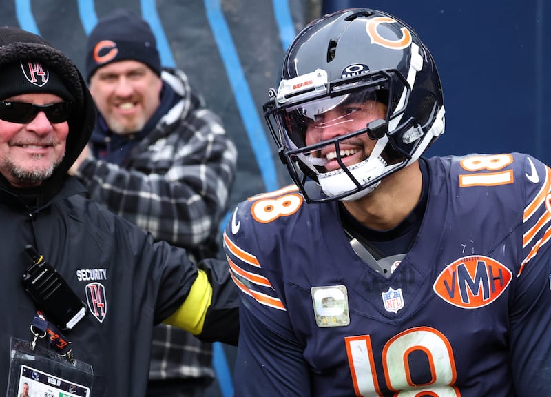 Chicago Bears quarterback Caleb Williams smiles after scoring a go-ahead touchdown late in the fourth quarter Sunday, Nov. 9, 2025, during their game at Soldier Field in Chicago.