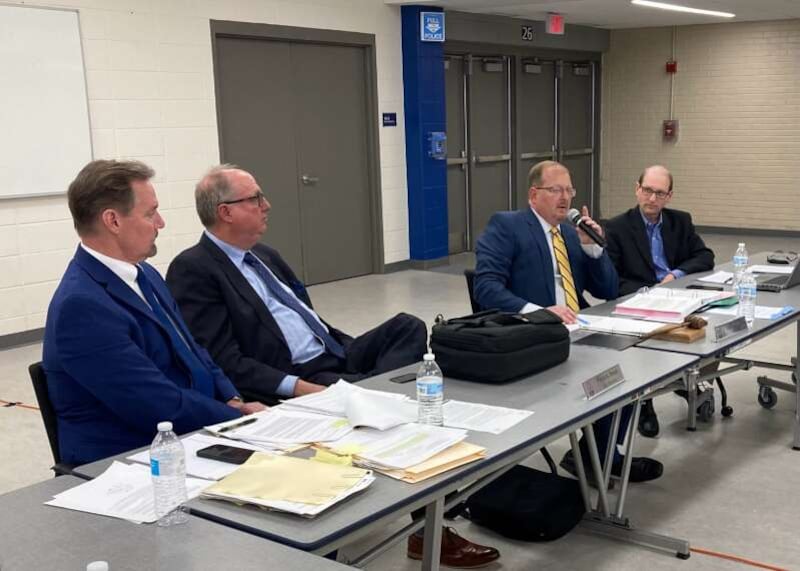 West Chicago Mayor Daniel Bovey speaks during the city council meeting on May 5. He is joined by attorney Patrick Bond, left, attorney Jeffrey Jacobson, second from left, and City Administrator Michael Guttman, right.