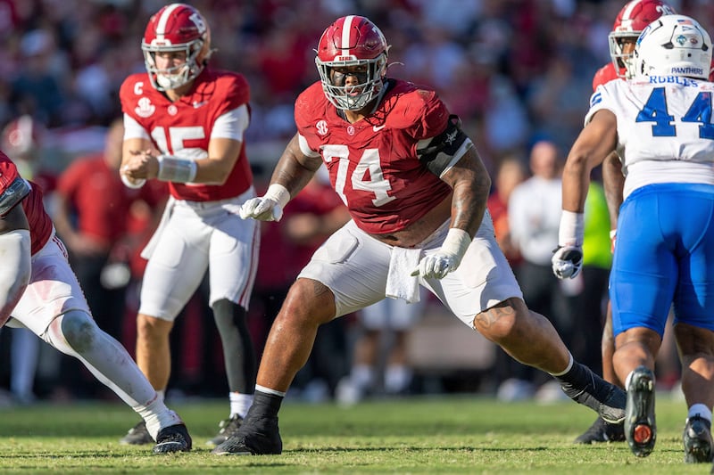 Alabama offensive lineman Kadyn Proctor (74) looks to block against Eastern Illinois during the first half of an NCAA college football game, Saturday, Nov. 22, 2025, in Tuscaloosa, Ala. (AP Photo/Vasha Hunt)
