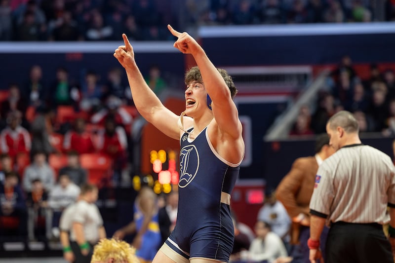Lemont’s Judah Heeg celebrates after beating Crystal Lake Central’s Cayden Parks in the 190 pound weight class of the 2A state individual wrestling finals Saturday, Feb. 22, 2025, at State Farm Center in Champaign.