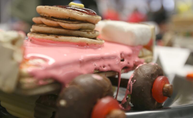 Frosting oozes off of one of the edible cars during the 29th annual Edible Car Contest on Wednesday, Feb. 26, 2025 in the cafeteria at Illinois Valley Community College.