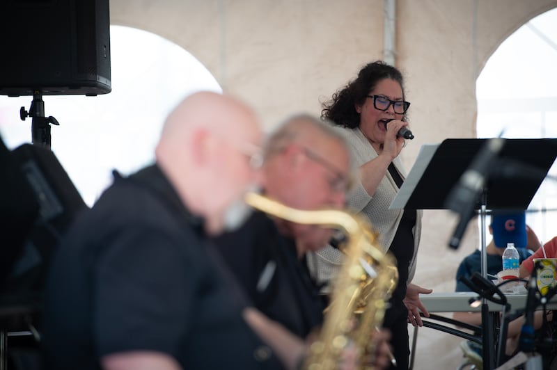 Misti Kohl sings with Jazz Time Big Band during the Strawberry Jazz Fest at Northfield Square Mall in Bradley on Sunday, June 1, 2025.