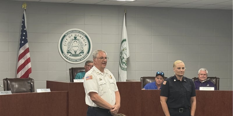 Mendota Fire Department Chief Dennis Rutishauser welcoming Jennifer Stampfler to the department at a ceremony held before the Mendota City Council on Monday, June 15, 2026.
