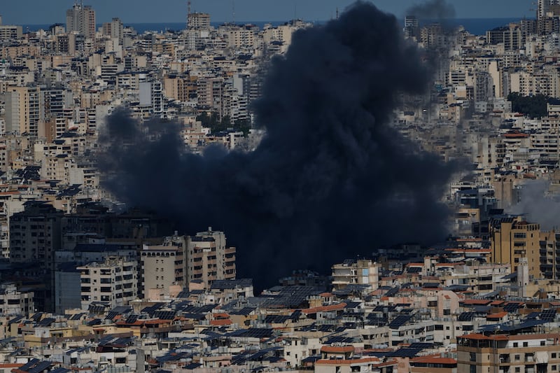Smoke rises following an Israeli airstrike in Dahiyeh, Beirut's southern suburbs, Lebanon, Monday, March 9, 2026. (AP Photo/Bilal Hussein)