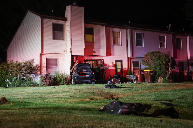 A car crashed into a townhouse in Woodstock at about 2:30 a.m. on May 30, 2026, while a family of four slept inside.