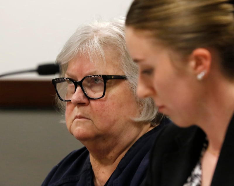 Roxanna L. Collins, 70, of McHenry, listens to court proceedings next to defense attorney Jennifer Recktenwald on Tuesday, June 3, 2025, during Collins’ initial appearance before Kenosha County Court Commissioner William Michel. She was charged with first-degree intentional homicide in the 2003 death of her husband, David Vanderzee.