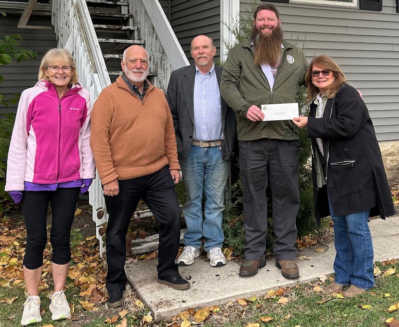 Friends of DeKalb County Treatment Courts board members receiving a $3,000 fall 2025 grant check from DeKalb County Community Foundation board member Brenda Jergens