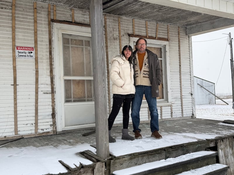 Wally Czwodzinski (right) and his daughter Isabelle Czwodzinski have partnered with Will County Habitat for Humanity to “Shine a Light on Affordable Housing” and turn the attention on the blinking solar lights at the boarded-up Plainfield house he owns into impact for Will County Habitat for Humanity by giving the lights to the nonprofit to help raise funds.
