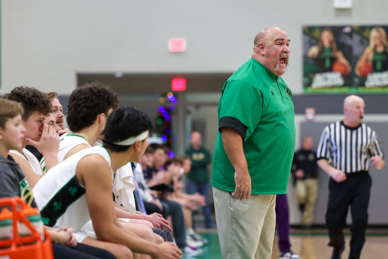 Seneca boys basketball head coach Russ Witte yells from the sideline on Saturday, December 28, 2024.