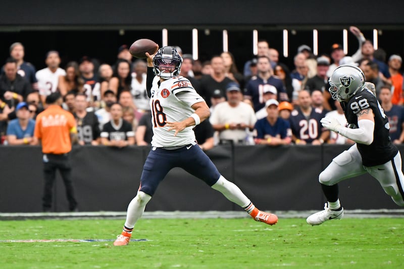 Chicago Bears quarterback Caleb Williams (18) throws a pass during the first half of an NFL football game against the Las Vegas Raiders Sunday, Sept. 28, 2025, in Las Vegas. (AP Photo/David Becker)