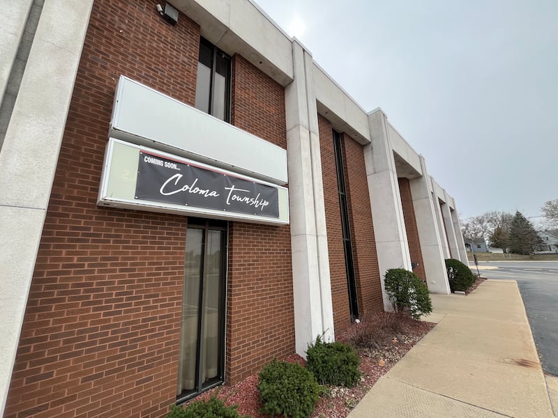 A "coming soon Coloma Township" is seen on the former US Bank building at at 300-302 First Ave. in Rock Falls on April 1, 2025. The property has been unusable since the townships former board approved the $250,000 in 2023 due to several building code violations.