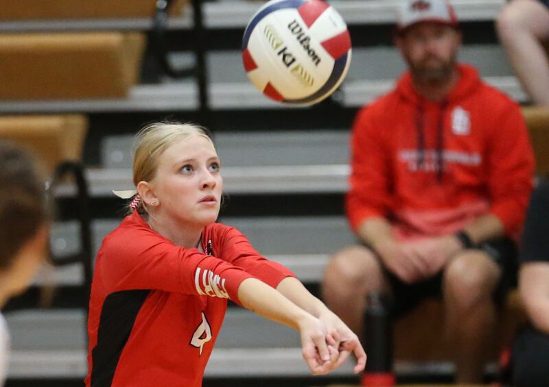 Henry-Senachwine's libero Taylor Frawley returns a serve from Woodland on Thursday, Oct. 3, 2024 at Henry-Senachwine High School.