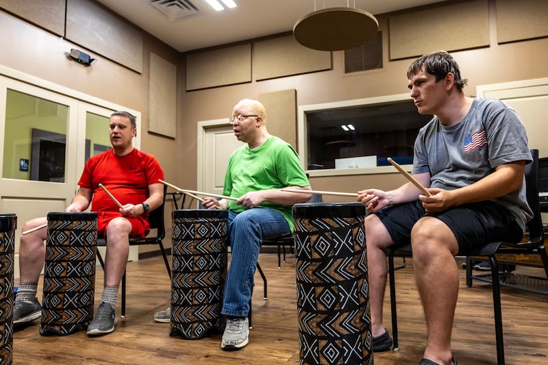 *** Do not publish until granted photo consent from Trinity Services***Trinity Services Studio 22 participants enjoy drum group on Aug. 28, 2025.