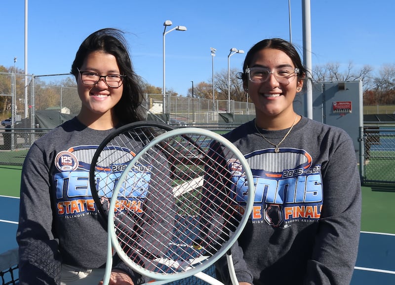 Ottawa's Zulee Morland and Yaquelin Hernandez-Solis pose for a photo on Wednesday, Nov. 12, 2025 at the Henderson-Guenther Tennis Facility at Ottawa High School. The pair are the 2025 Ottawa Times girls tennis players of the year.