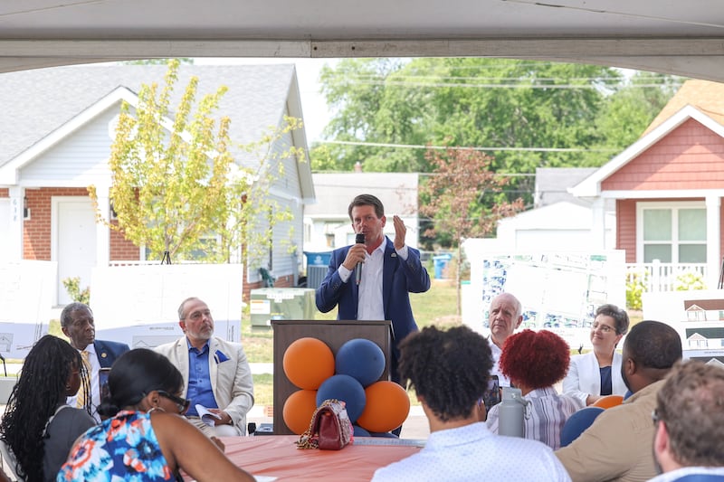 Kankakee Mayor Chris Curtis speaks during the West Harbor Residences ribbon cutting and street dedication ceremony on Wednesday, July 23, 2025. Curtis referenced his goal to build 500 new housing units by 2030 and said he will count these 36 units toward that goal. “Affordable housing is not a negative word; it’s a positive word,” Curtis said.