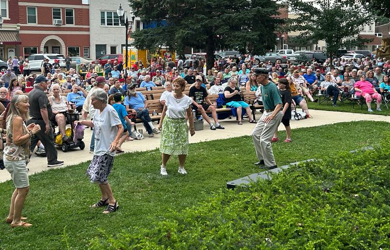 People move to the music of Captain Rat and the Blind Rivets during the Mt. Morris Jamboree concert on Friday, Aug. 15, 2025.