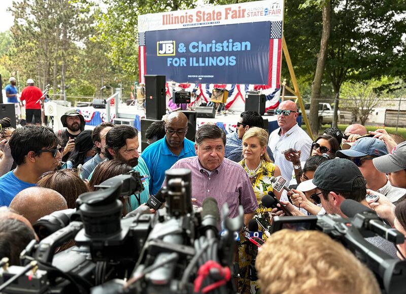 Gov. JB Pritzker takes questions from the news media at the Illinois State Fair on Wednesday, Aug. 13, 2025.