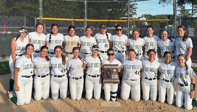 Members of the St. Bede softball team pose with the Class 2A Regional final plaque on Friday, May 23, 2025 at St. Bede Academy.