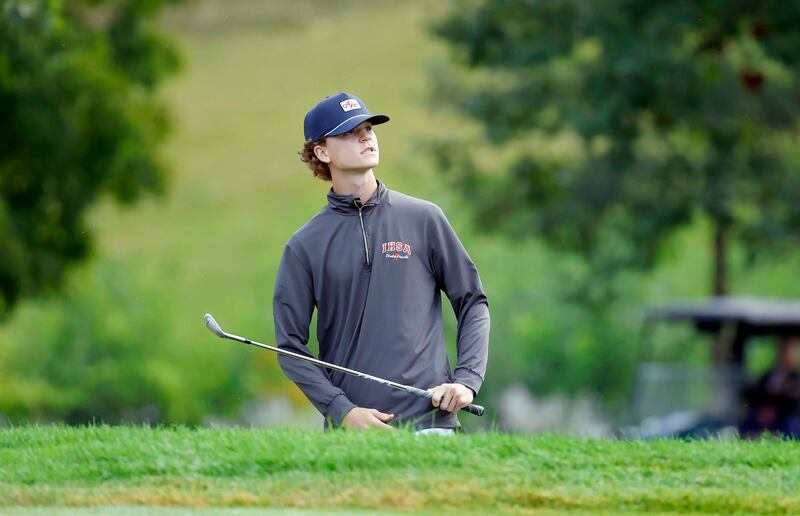 Logan Novay of Geneva checks his chip shot to the green during the DuKane Conference boys golf tournament at Bartlett Hills Tuesday, Sept. 23, 2025 in Bartlett.