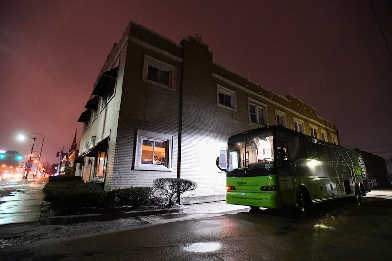 Fortitude Community Outreach's Night Fort bus warms up outside the Salvation Army in Kankakee in January 2024. The shelter has partnered with the Salvation Army on East Court Street to provide a place for meals, showers, laundry and fellowship before guests board the bus, retro-fitted with bunks, to sleep.
