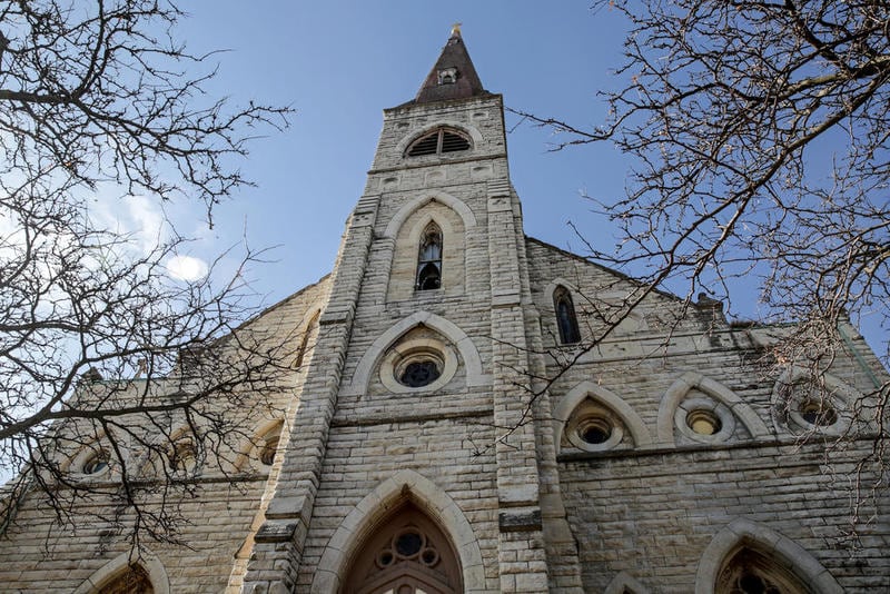 The front steeple of St. Mary Carmelite Church can be seen Friday, Nov. 22, 2019, in downtown Joliet, Ill.