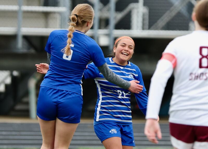 Princeton's Yocelyn Robledo (right) celebrates her goal with teammate Ella Grey during Tuesday's soccer match at Bryant Field against IVC. The Tigresses won 9-0.
