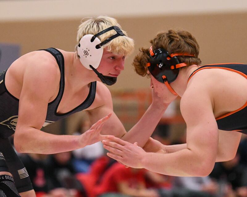 Sycamore's Cooper Bode wrestles Libertyville James Scanio during the 175-weight class during the Don Flavin invite on Friday Dec. 27, 2024, held at DeKalb High School.