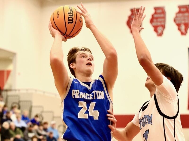 Princeton senior Ryan Jagers shoots over Bureau Valley Saturday during the Colmone Classic at Hall High School. The Tigers won 86-83 in double OT.