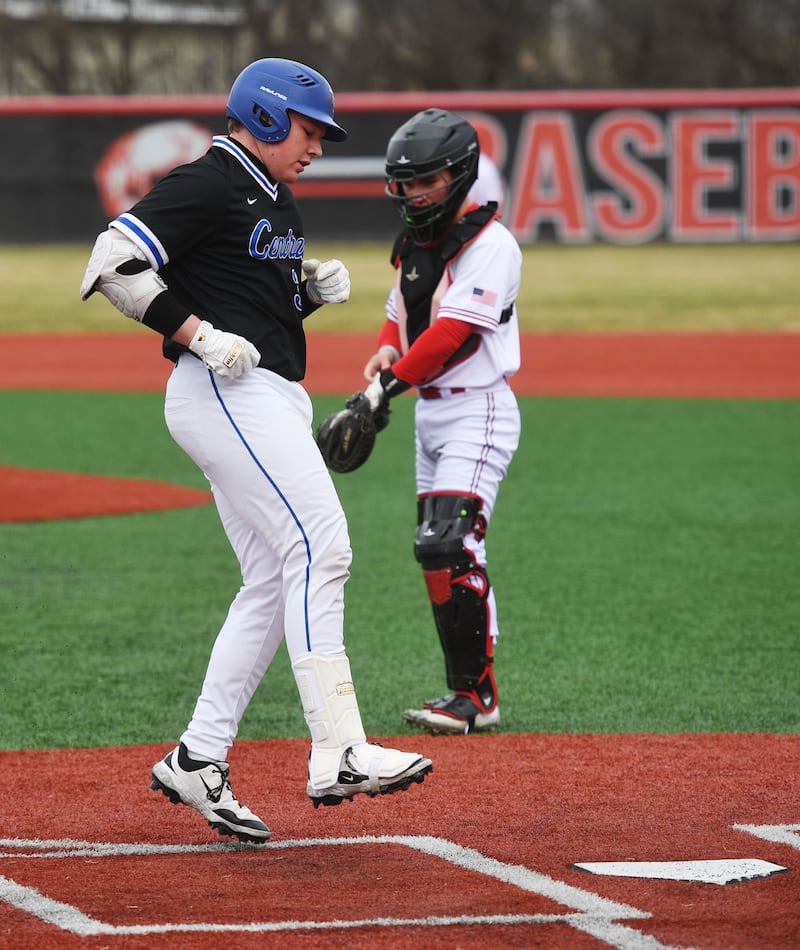 Burlington Central’s Liam Schultz steps toward the plate as Barrington catcher Ryan Costello watches during the third inning of Friday’s game at Barrington.