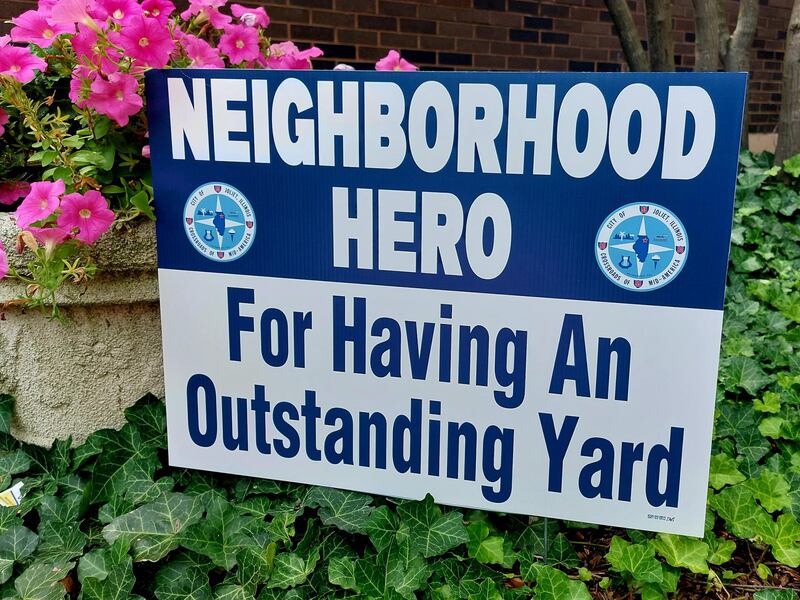 Sign posted at the home of a Neighborhood Hero award winner in Joliet. May 7, 2025