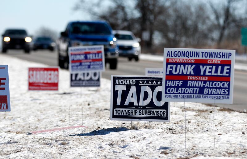 Campaign signs on Thursday, Feb. 20, 2025, at the Algonquin Township Office at 3702 US Hwy 14, in Crystal Lake.