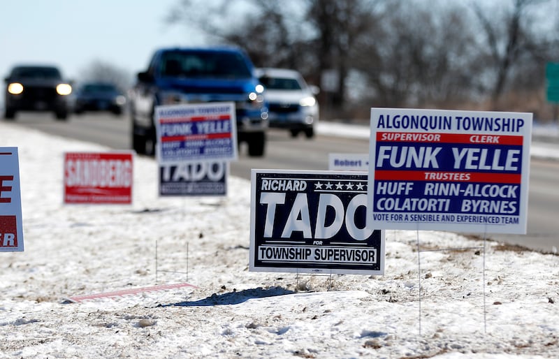 Campaign signs on Thursday, Feb. 20, 2025, at the Algonquin Township Office at 3702 US Hwy 14, in Crystal Lake.