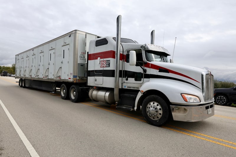 Semi-trailer truck bringing in supplies to the Joliet Local Training Area site for the Illinois National Guard at 20612 Arsenal Road in Elwood on Tuesday, Oct. 7, 2025. Texas National Guard troops were moving in Tuesday for their planned deployment to Chicago.