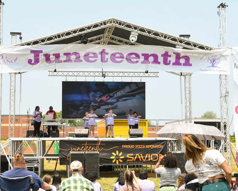 Yorkville’s step team preforms during the Juneteenth celebration on Saturday June 17, 2023 held at Emily G. Johns School in Plano.